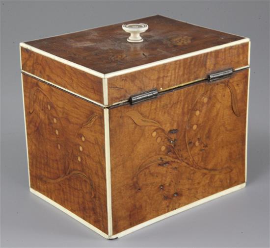 A Regency satinwood, marquetry and ivory inlaid tea caddy, width 5in.